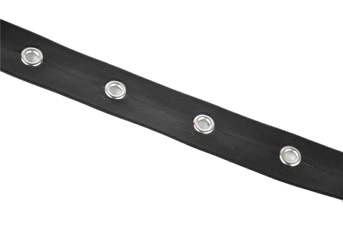 Black leather strap with silver grommets, perfect for edgy fashion accessories.