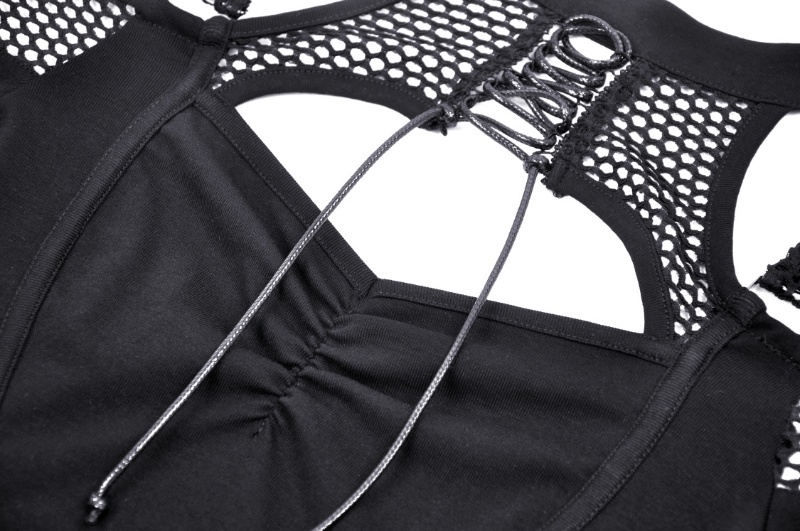 Close-up of black mesh off-shoulder top showcasing intricate fishnet design and adjustable details.
