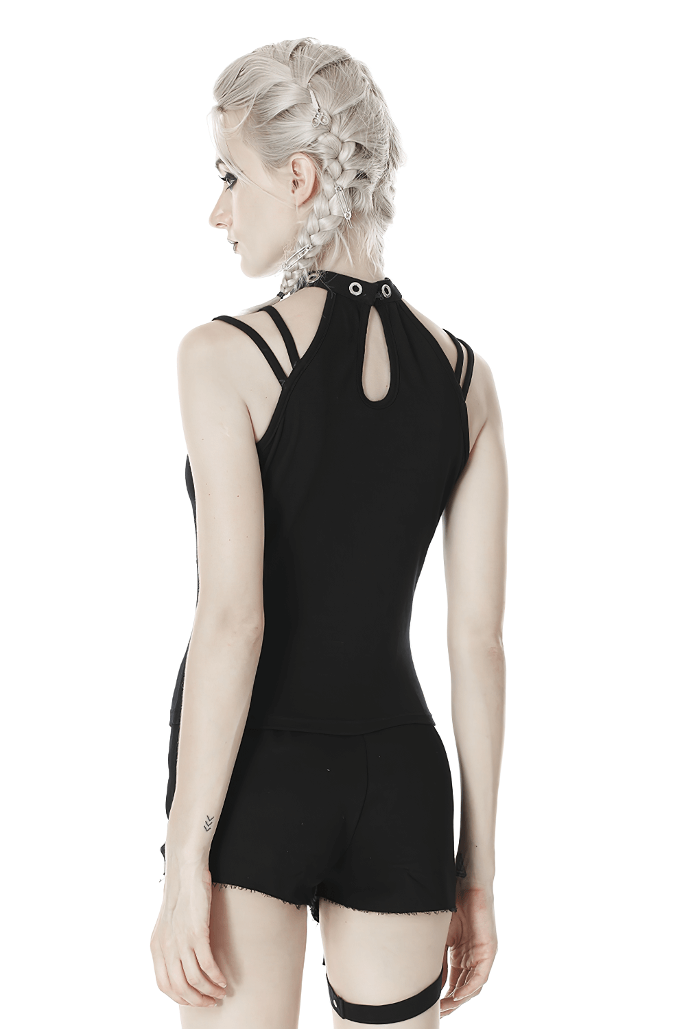 Back view of an edgy black mesh-panel crop top with strappy design, showcasing its sleek look.