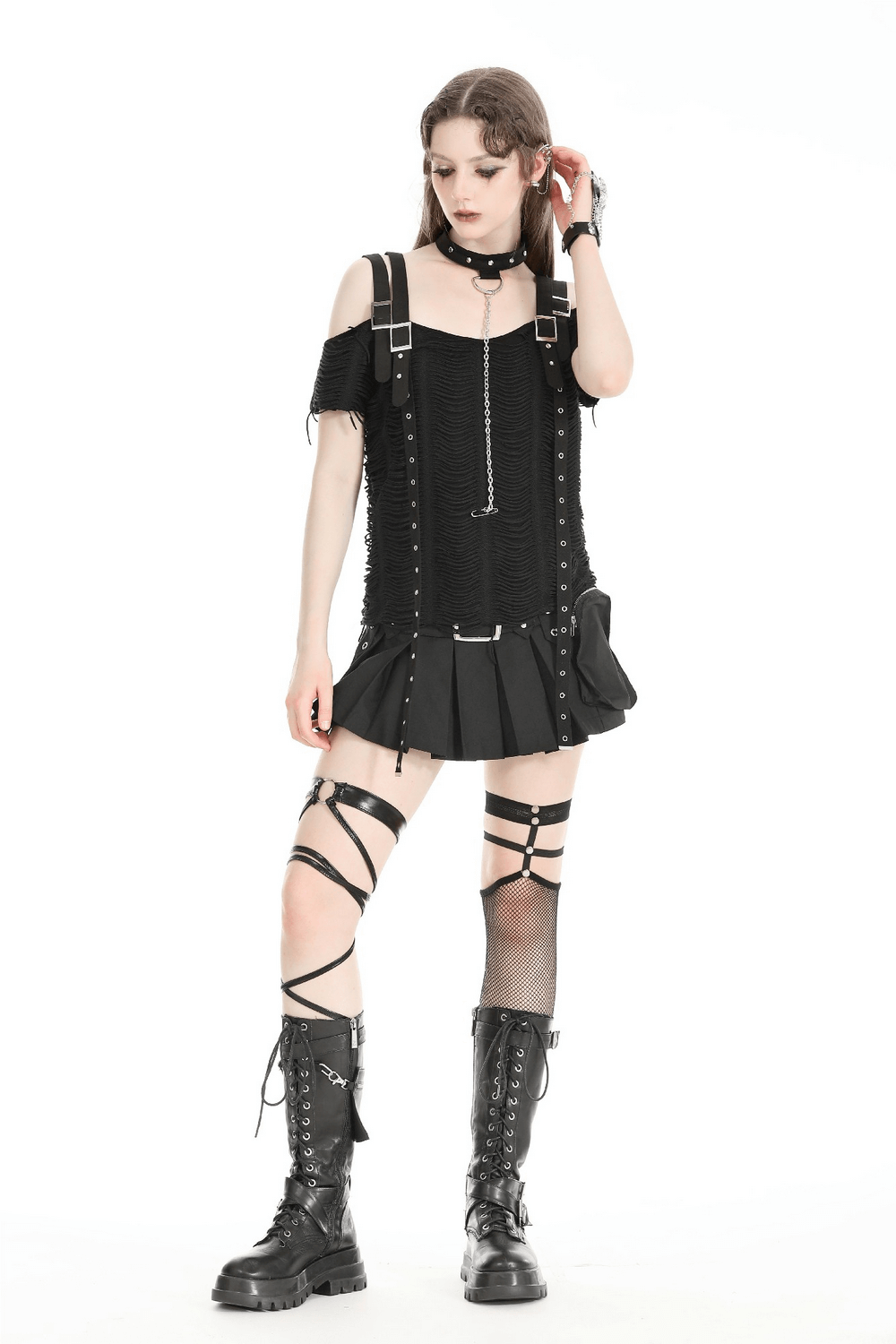 Edgy black off-shoulder punk top with choker, paired with fitted skirt and lace-up combat boots, showcasing a bold goth look.