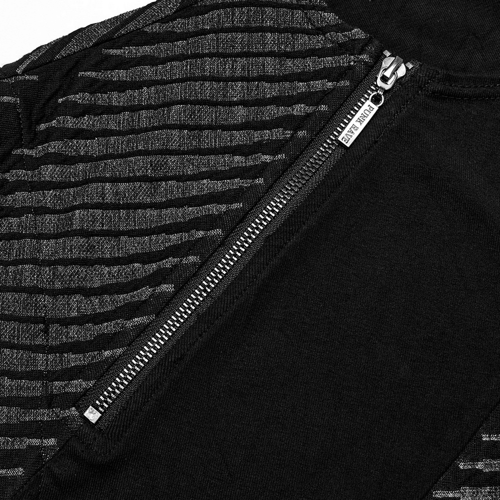Close-up of edgy black spliced top featuring 3D jacquard design and stylish zipper detail.