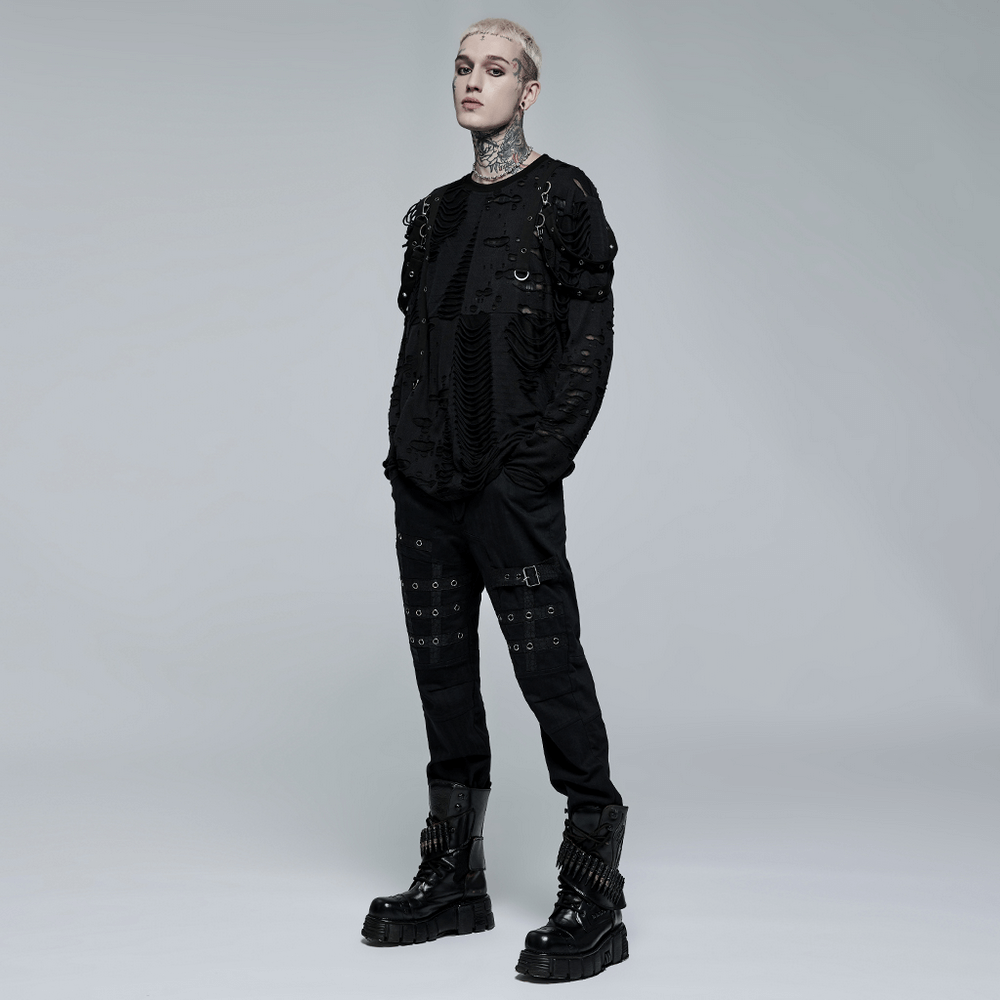 Model showcasing edgy black strap cargo pants with avant-garde detailing, perfect for punk goth streetwear style.
