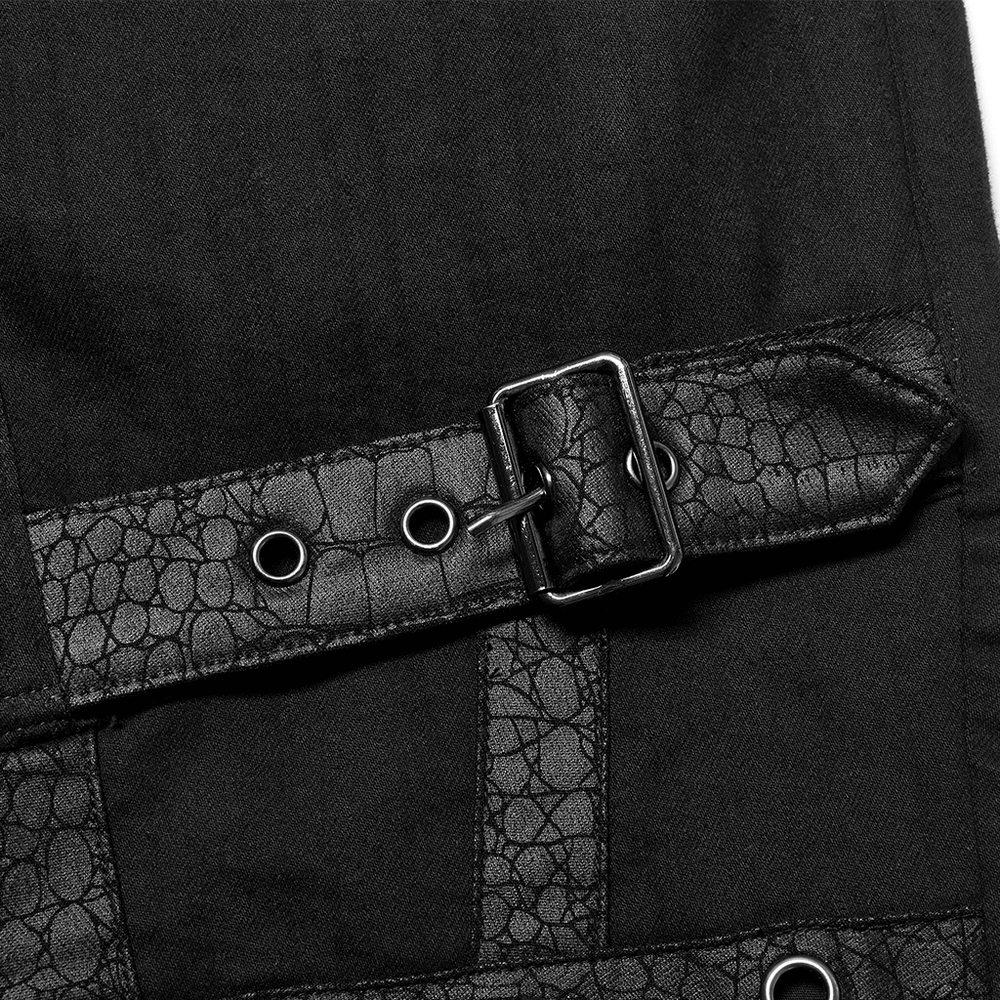 Close-up of a black strap on cargo pants featuring a textured buckle and eyelet details, perfect for punk goth streetwear.