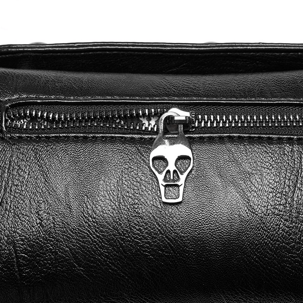 Close-up of the edgy black crossbody bag's back zipper featuring a unique skull pendant for a gothic flair.