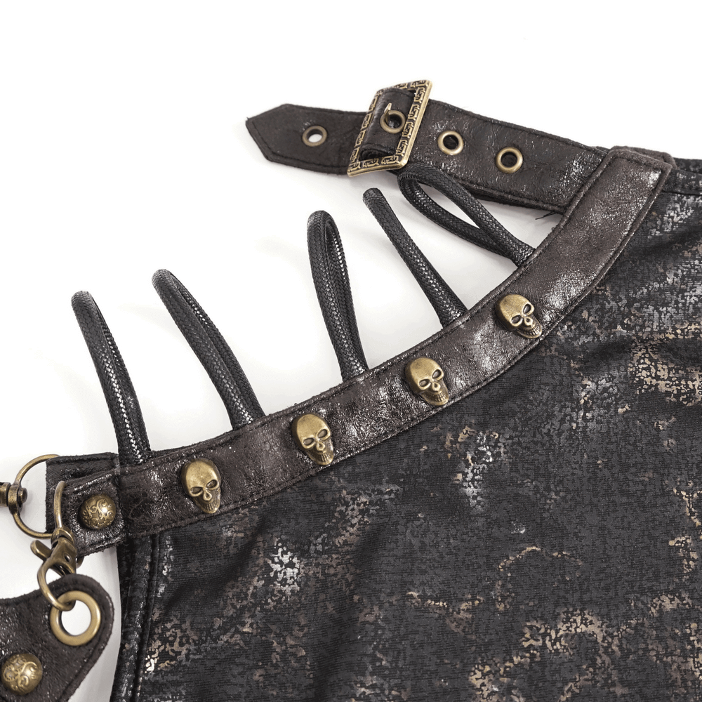 Close-up of edgy black t-shirt with skull detailing, showcasing unique design and stylish elements.