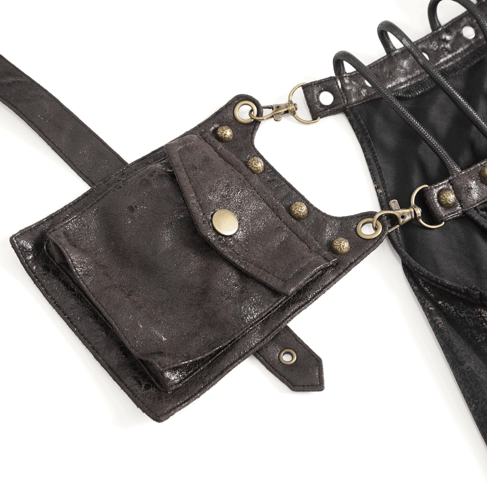 Stylish black faux leather harness bag with decorative pocket and gold-tone studs.
