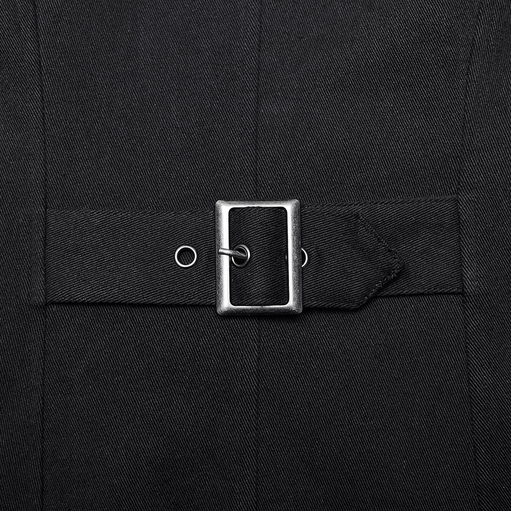 Close-up of edgy black trench coat belt with silver D-buckle and eyelet detail, showcasing punk-inspired design.