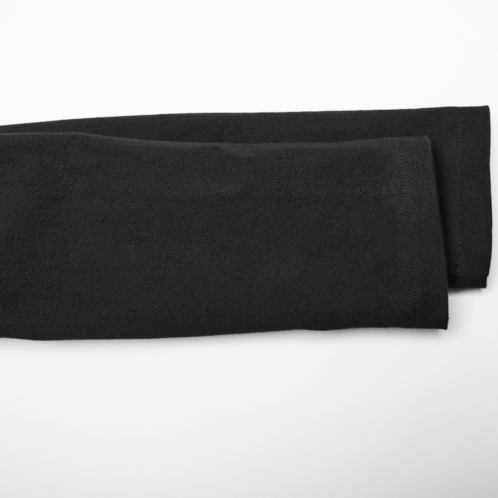 Close-up of rolled black fabric, perfect for edgy fashion designs and stylish winter garments.