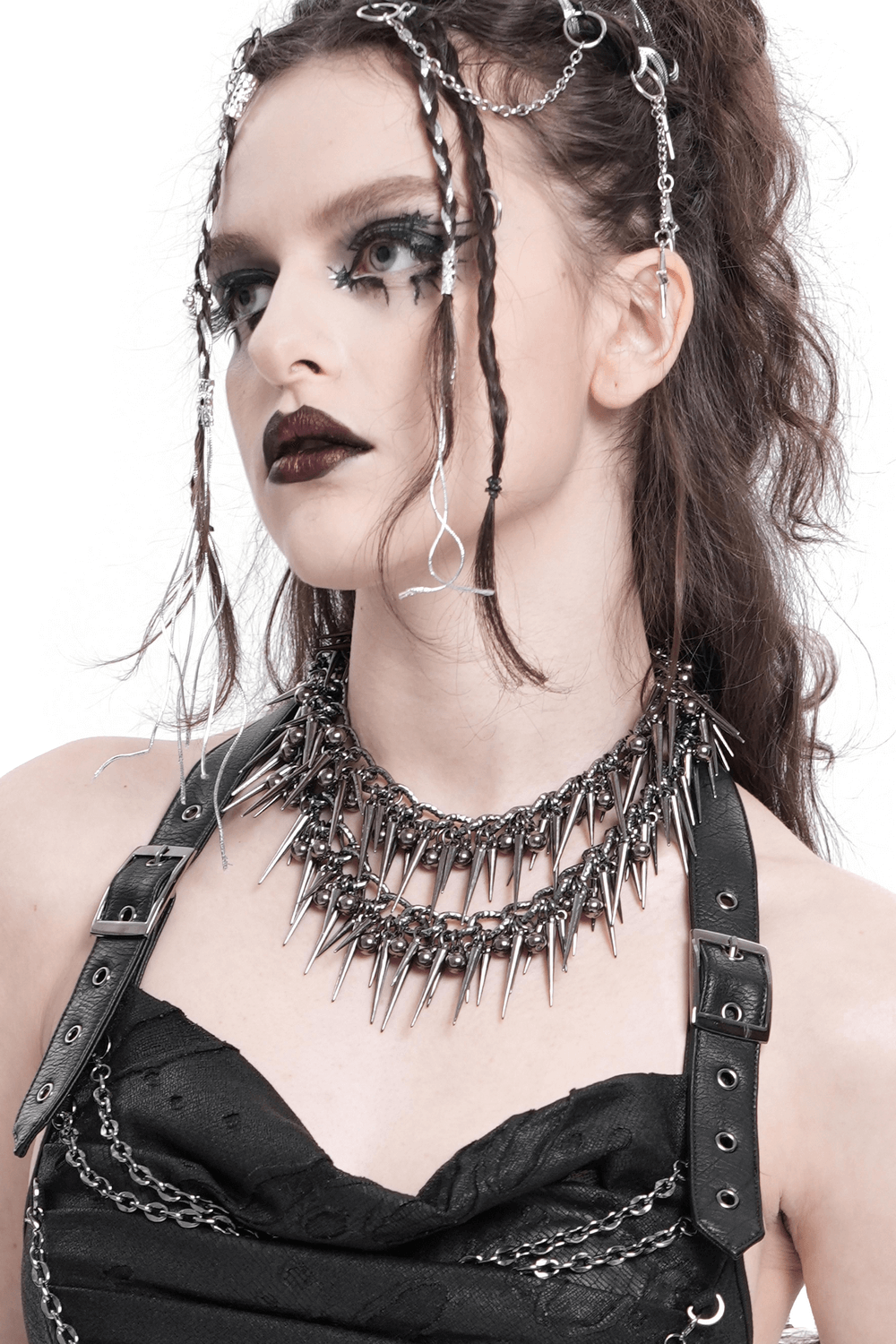 Edgy chain and bead statement choker for women, featuring a spiky design and layered chains.