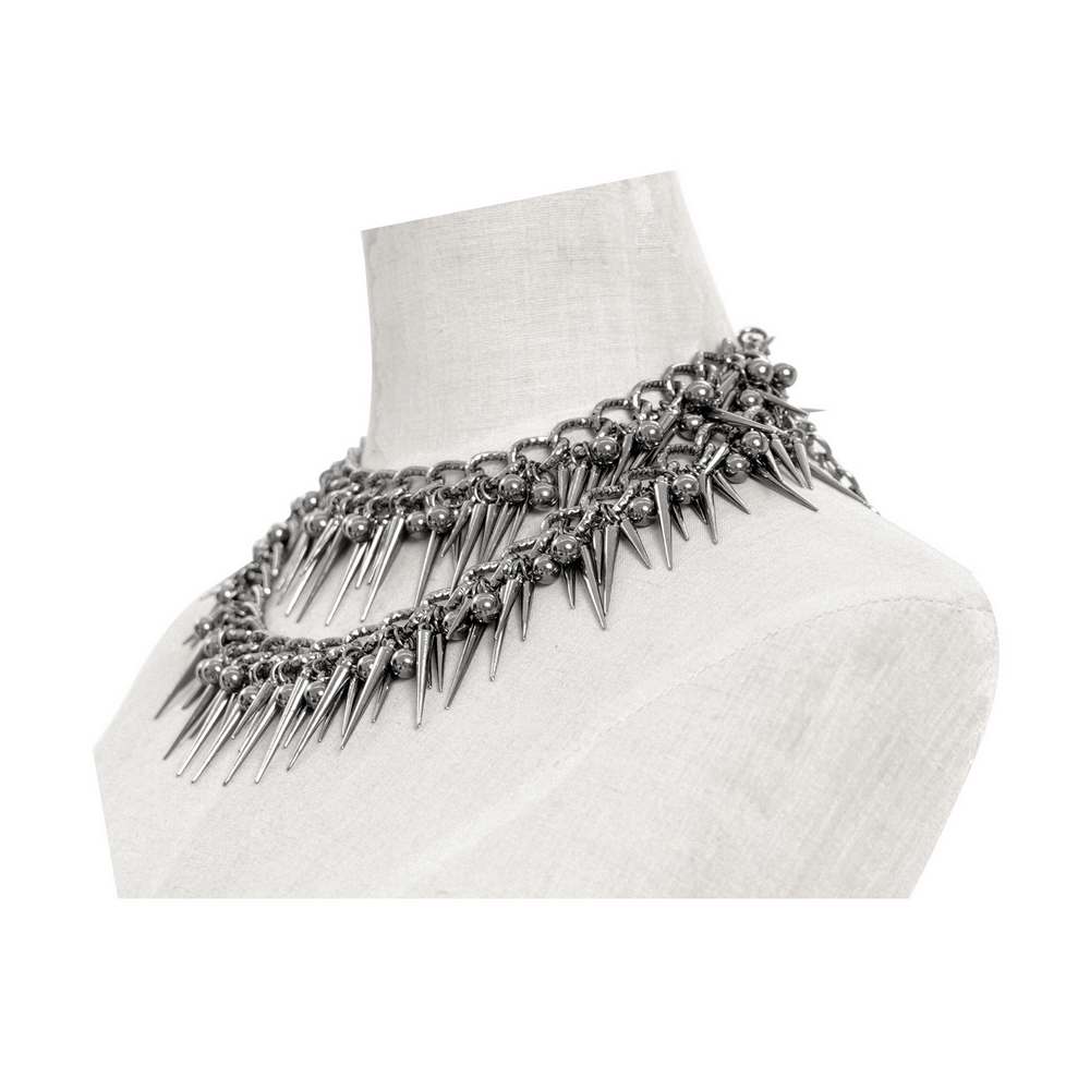 Edgy chain and bead statement choker for women, featuring spikes and silver accents, perfect for bold fashion choices.