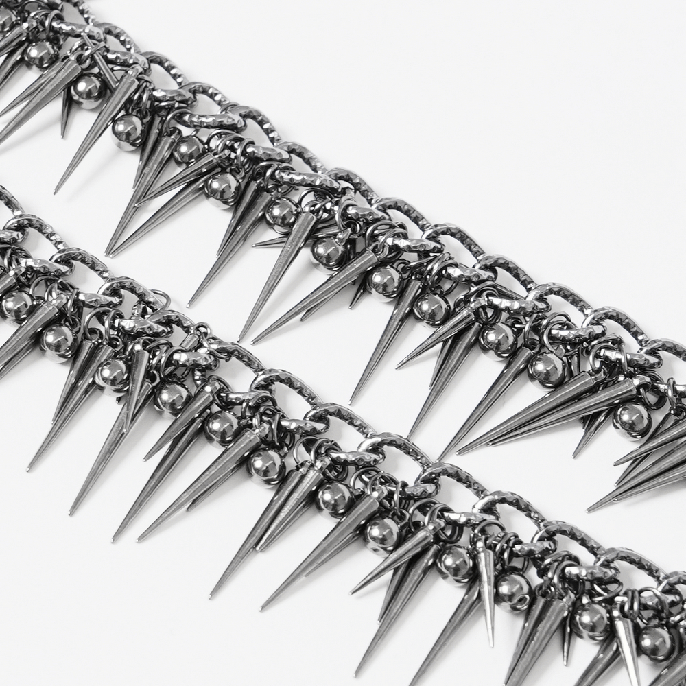 Edgy chain and bead statement choker featuring spikes and beads, perfect for fashion-forward women.