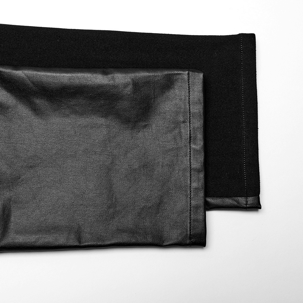 Close-up of edgy elastic men's trousers showcasing sleek rubberized and twill fabrics for a stylish urban look.