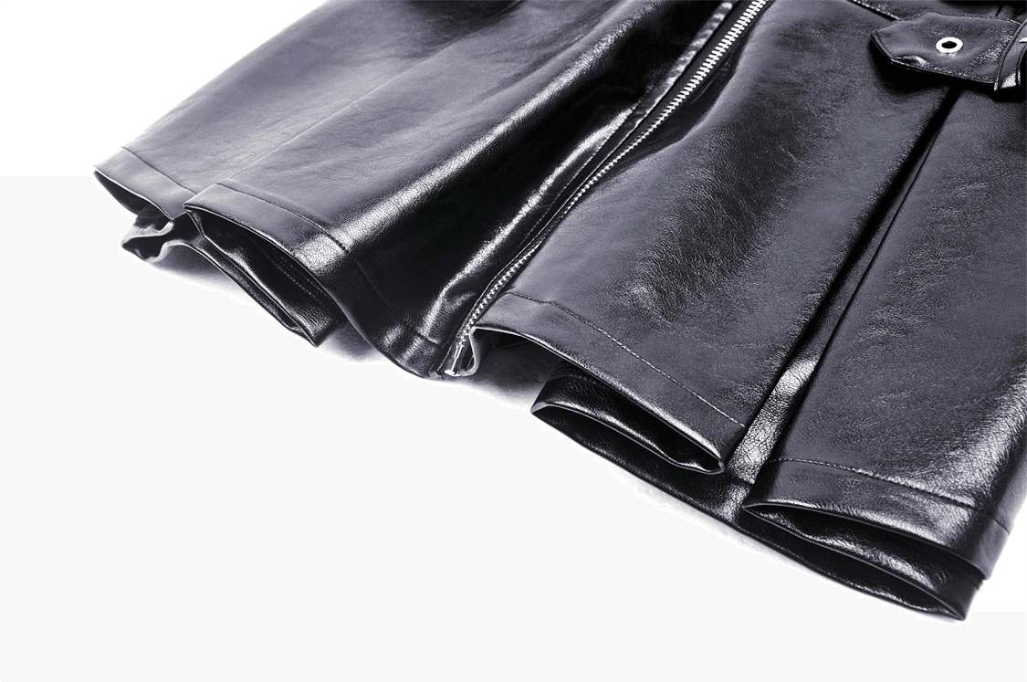 Close-up of a chic black faux leather mini dress with a zip and stylish pleats, perfect for edgy fashion lovers.