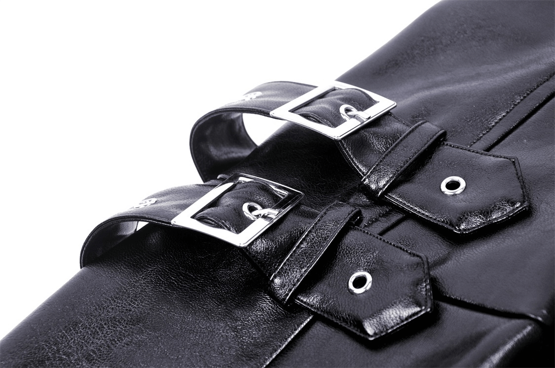 Close-up of stylish buckles on a black faux leather outfit, adding an edgy touch to modern fashion.