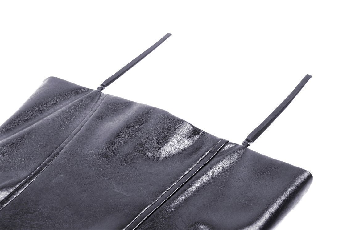 Close-up of edgy faux leather mini dress showcasing sleek black material and stylish straps.