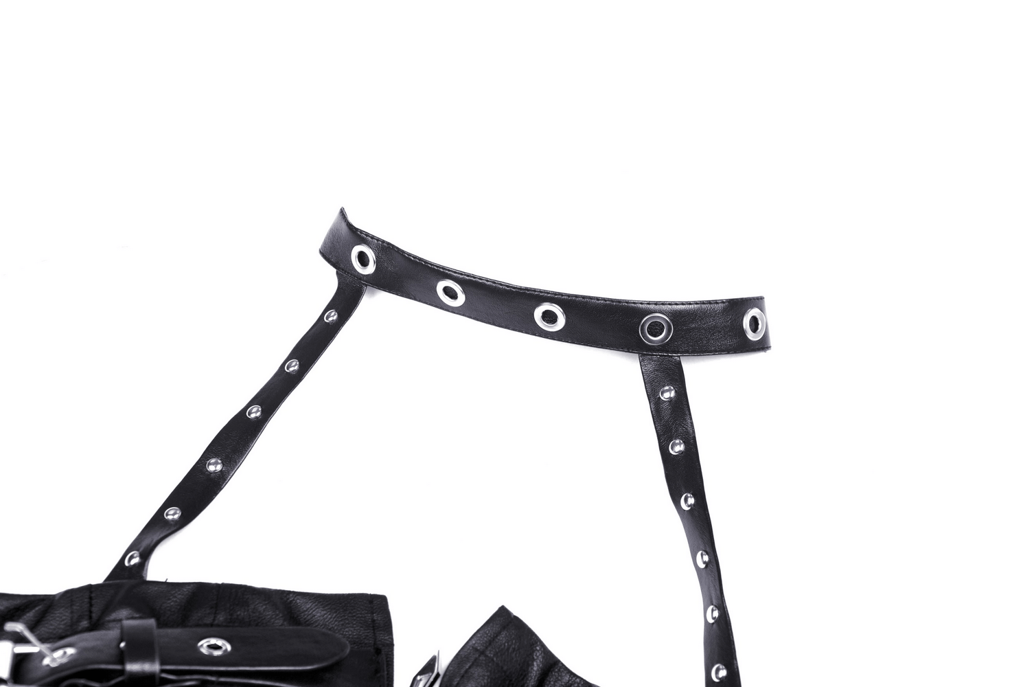 Close-up of edgy black faux leather halter dress with metal accents and unique strap design.