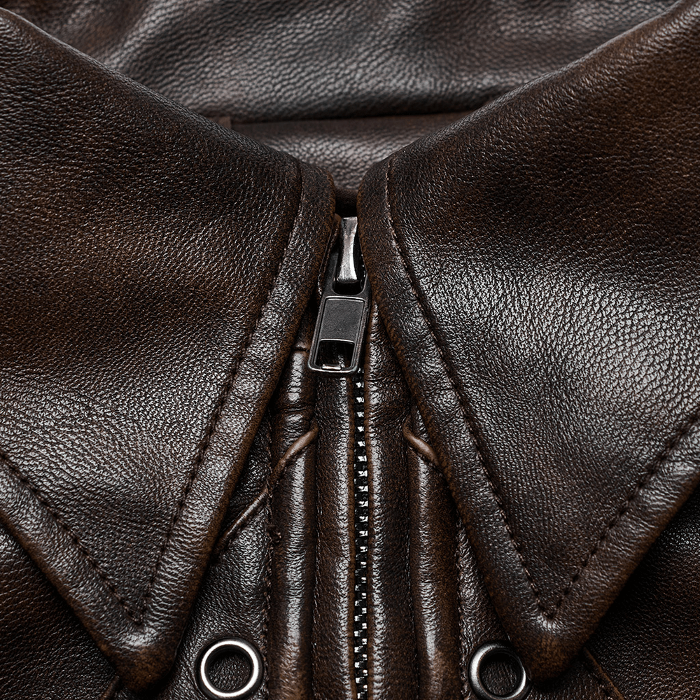 Close-up of edgy faux leather punk crop jacket with distinctive zip and collar details.