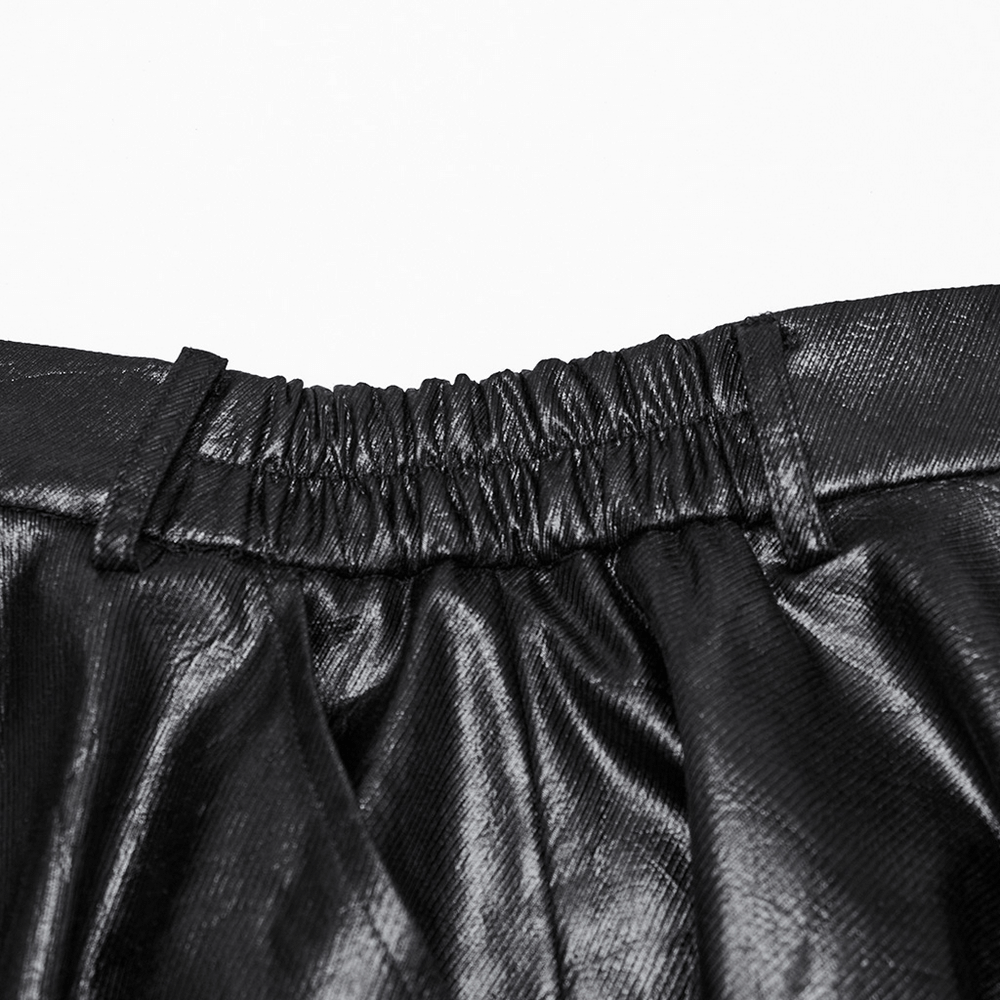 Close-up of the waistband of an edgy faux leather skirt featuring an elastic detail for a perfect fit.