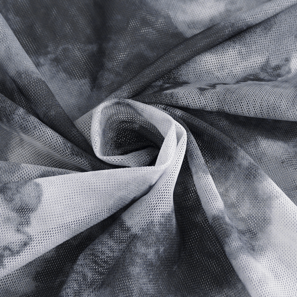 Close-up of edgy grey and white tie-dye fabric, showcasing a modern, artistic pattern for a trendy top.