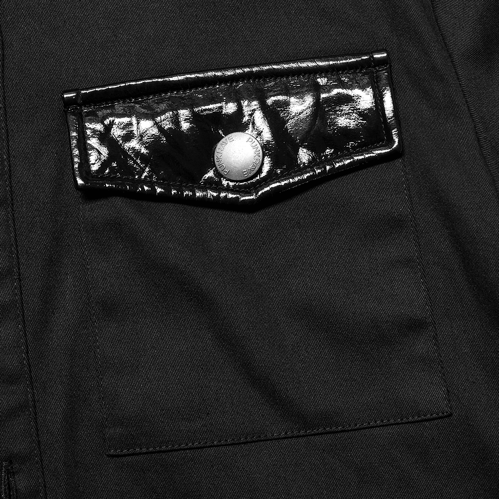 Close-up of shiny patent leather pocket detail on a gothic shirt, showcasing edgy punk style.