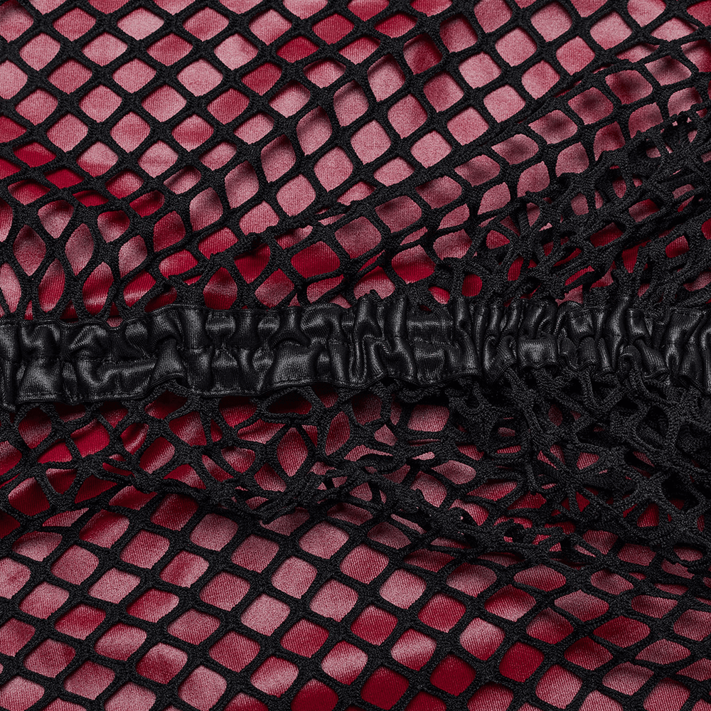 Close-up of edgy goth dress fabric featuring elastic mesh in a unique red and black pattern for a bold look.