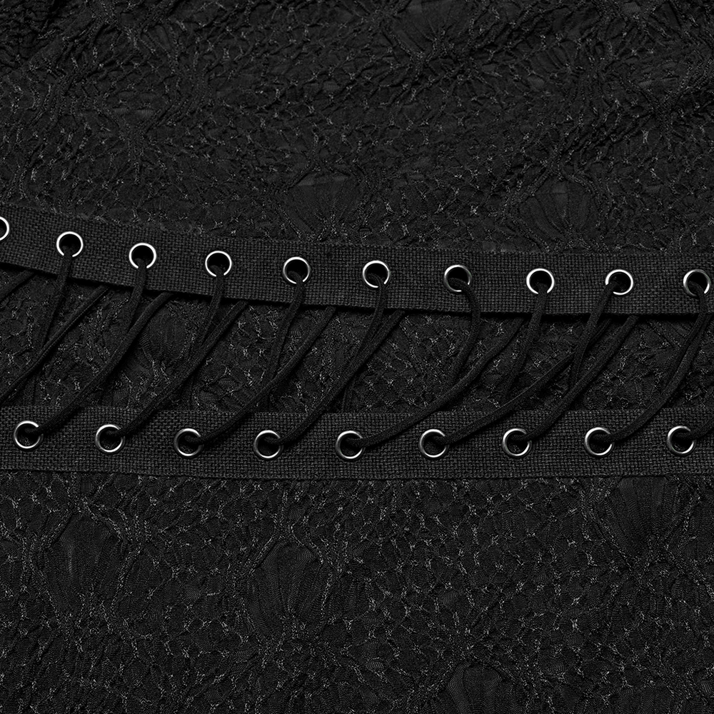 Close-up of elegant black fabric with a 3D jacquard weave and stylish front webbing detail.