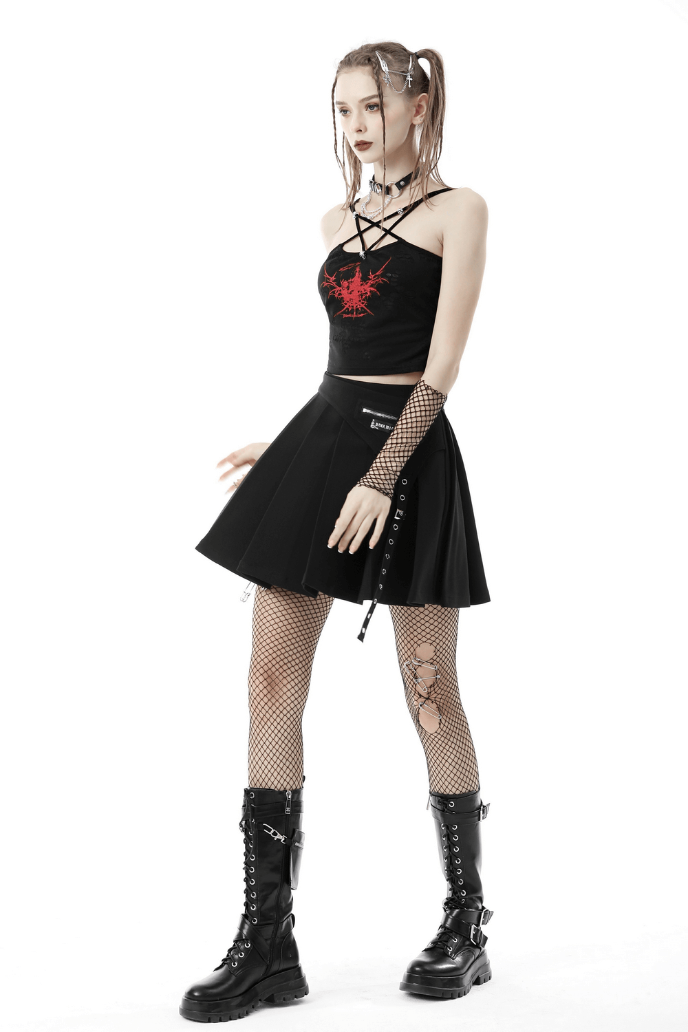 Edgy gothic black crop top with red print, paired with a black skirt and fishnet tights for a bold look.