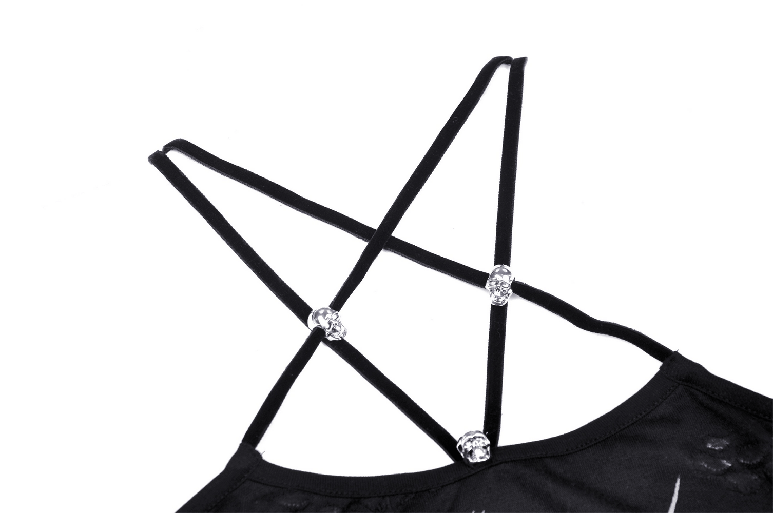 Close-up of the strappy back design on a black crop top, featuring stylish silver embellishments and sleek straps.