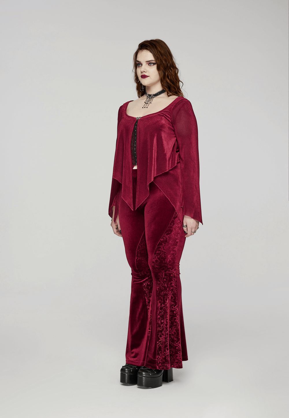 Burgundy gothic two-piece top with hooks, worn with matching flared pants for an edgy, stylish look.