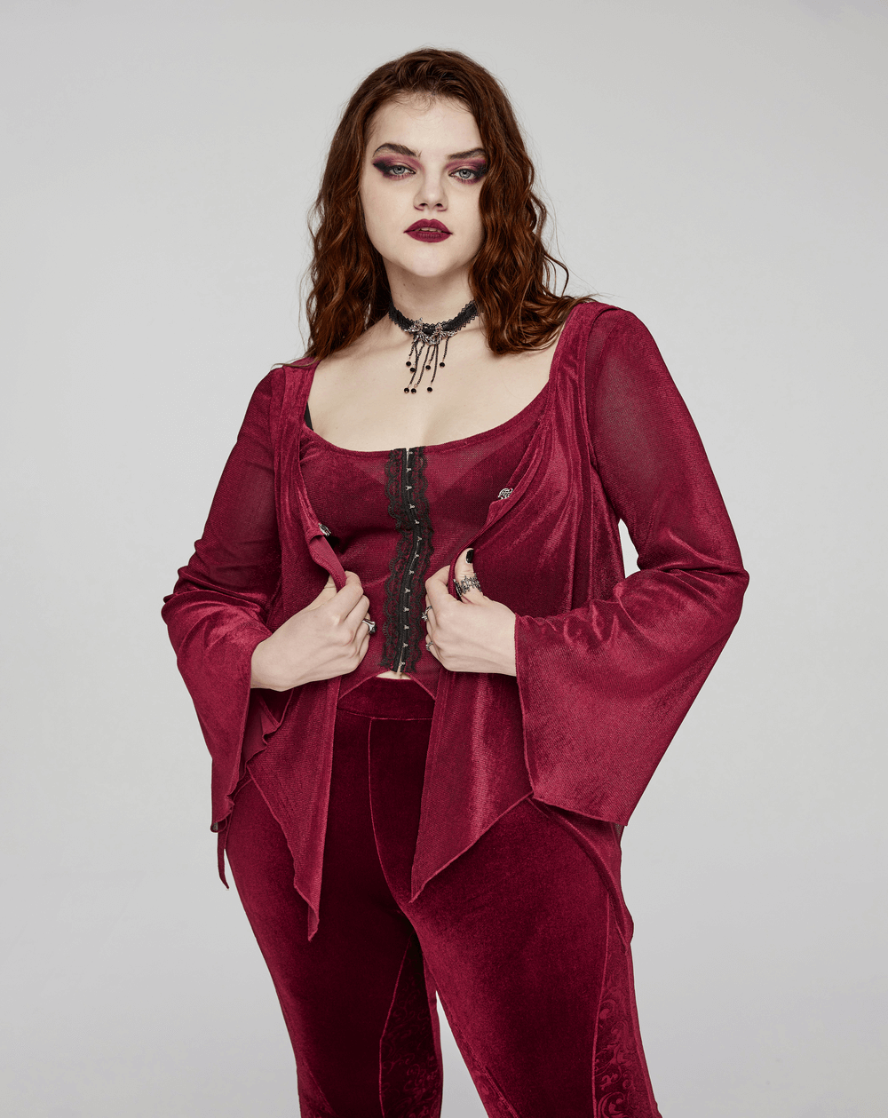 Edgy burgundy gothic two-piece top with lace hooks, showcasing a stylish layered design and bell sleeves.