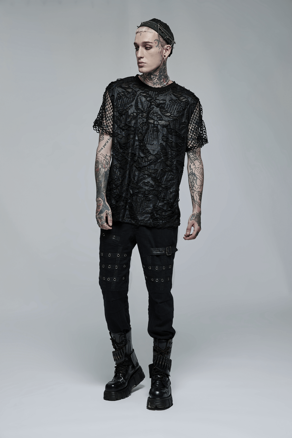 Edgy Gothic Mesh Layered Tee worn by a model, featuring textured mesh overlay and unique design for a bold urban look.