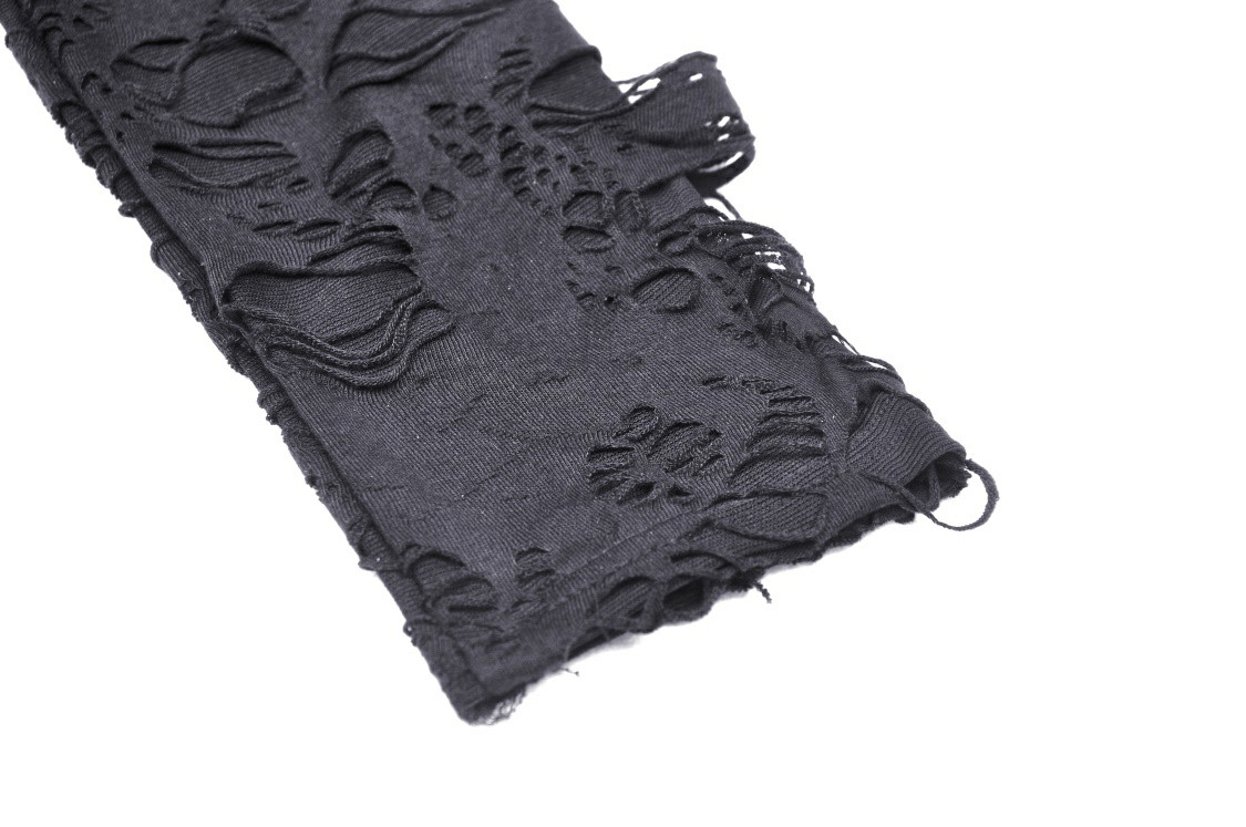 Close-up of edgy black sweatshirt detail featuring distressed fabric and sheer floral mesh overlay.