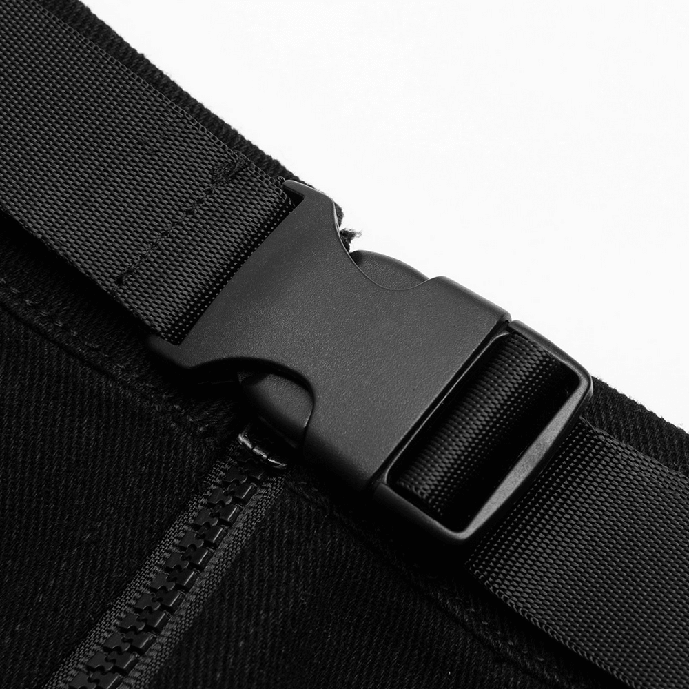 Close-up of a black buckle on a strap, showcasing durable material and sleek design for secure fastening.