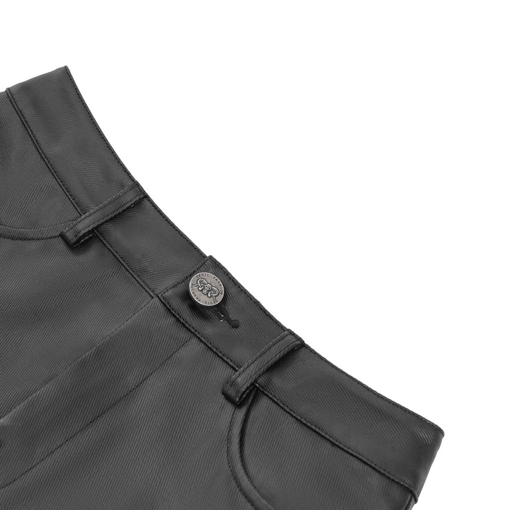 Detail of a high-waisted black mini skirt showcasing the waistband and button, perfect for punk fashion enthusiasts.