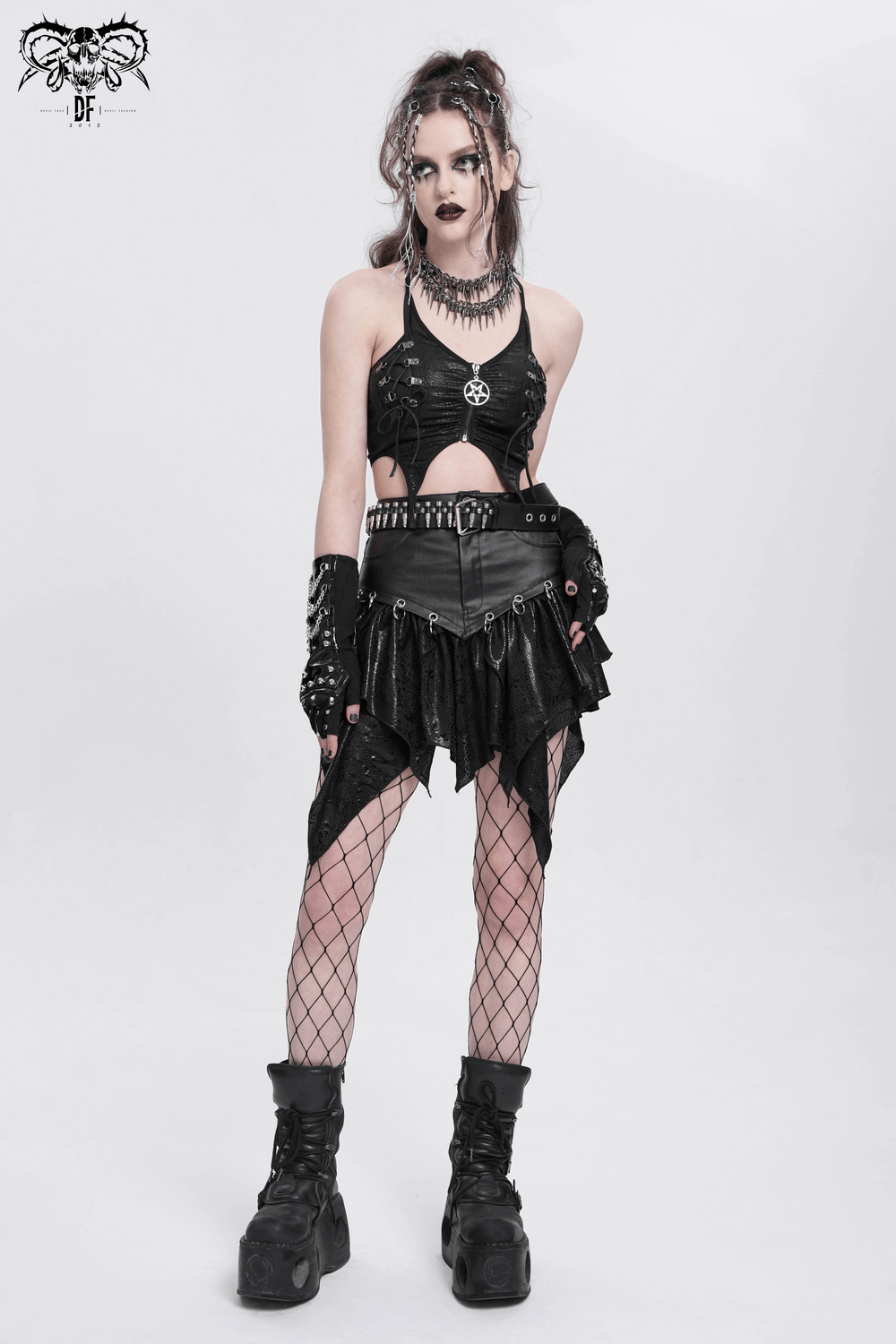 Model in punk outfit showcasing edgy black high-waisted skirt and accessories, perfect for alternative fashion lovers.