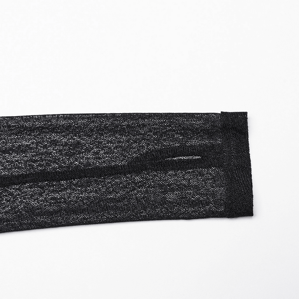 Close-up of black elastic mesh fabric, showcasing its intricate texture for edgy fashion designs.