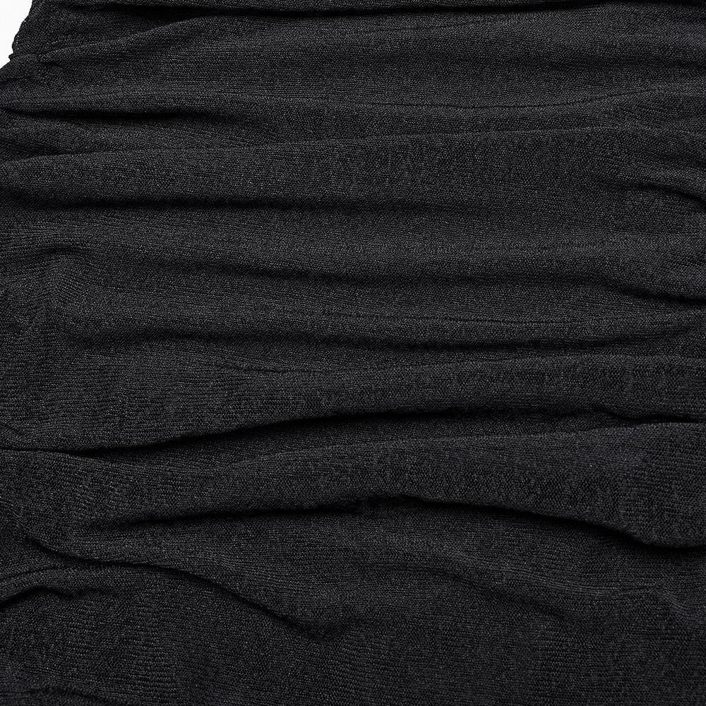 Close-up of soft, textured black fabric showcasing the ruched details of an edgy hooded dress.