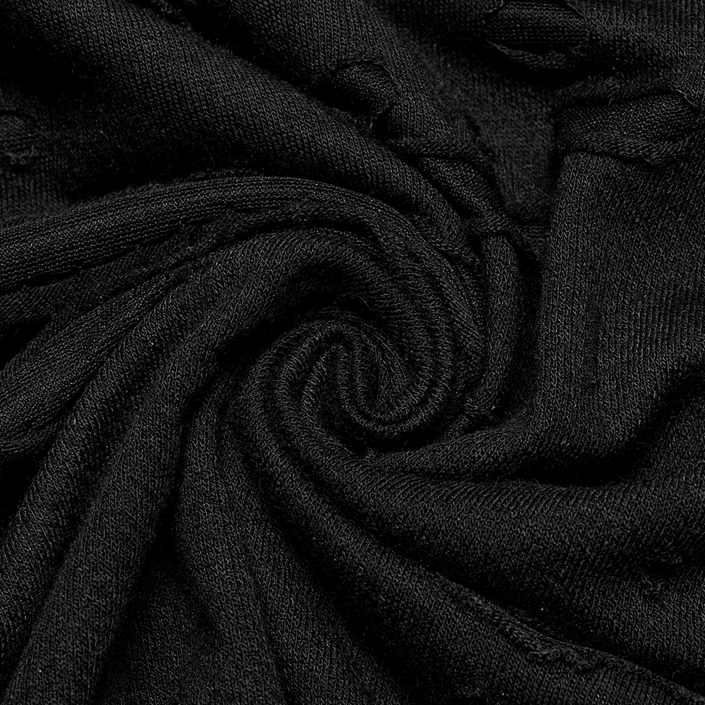 Close-up of a textured black knitted fabric featuring destructed holes, highlighting its edgy goth style.