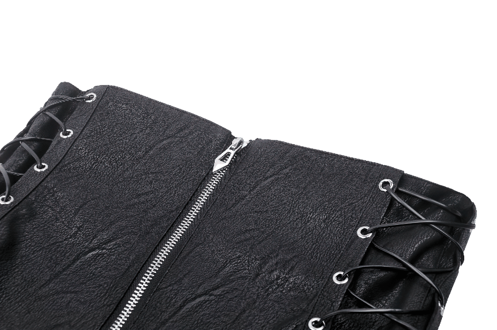 Close-up of black leather corset belt with lace-up design and zipper detail, showcasing its edgy style.