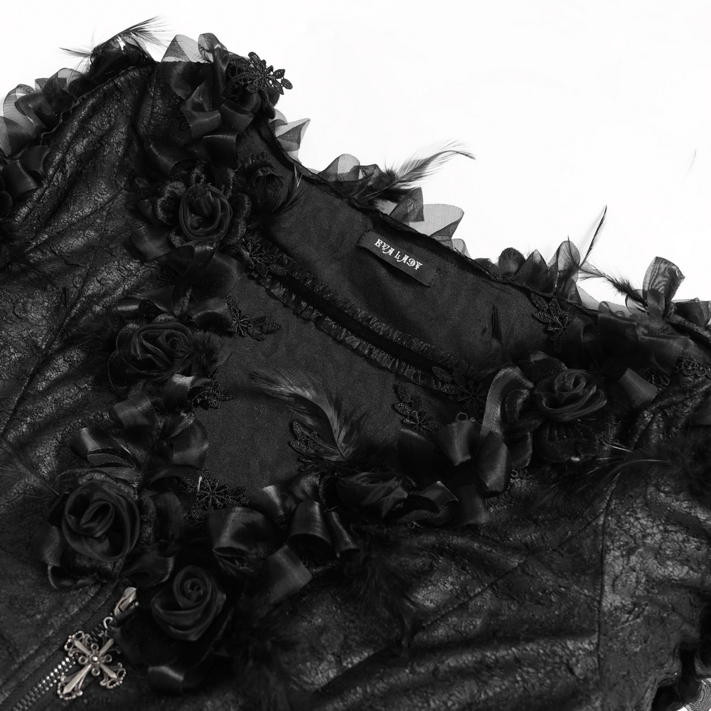Edgy Lace-Up Blouse with Rose Trim and Bell Sleeves featuring black floral details and ruffled trim.