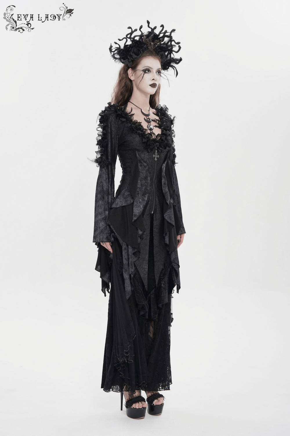 Edgy Lace-Up Blouse with Rose Trim and Bell Sleeves styled with gothic elements and dramatic details for a bold look.