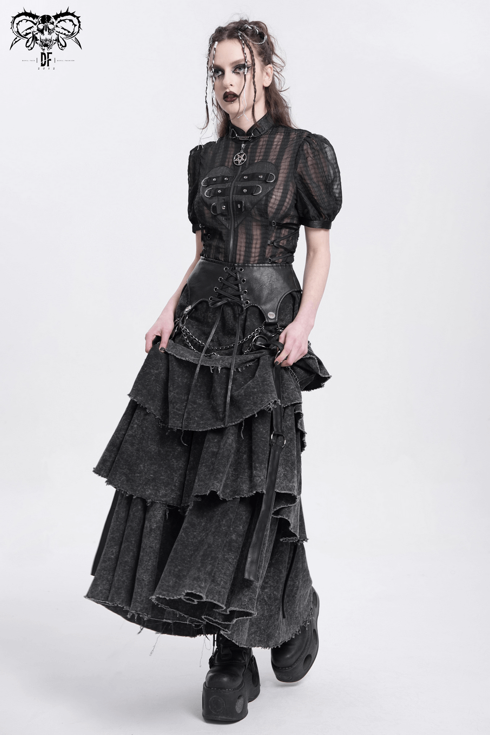 Edgy layered gothic skirt with chains and lace-up, perfect for bold fashion and festivals.