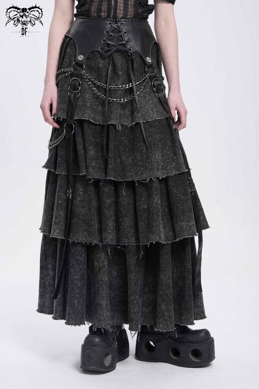 Layered gothic skirt with chains and lace-up waist, perfect for edgy fashion and festivals.