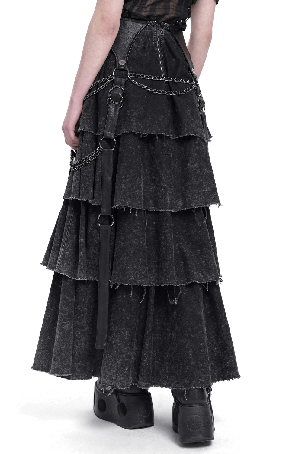 Back view of a layered gothic skirt featuring chains and lace-up details, perfect for edgy fashion lovers.