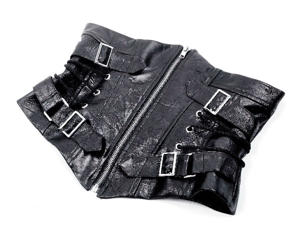 Edgy black leather corset belt with zipper, buckle details, and side lacing for a punk-inspired look.