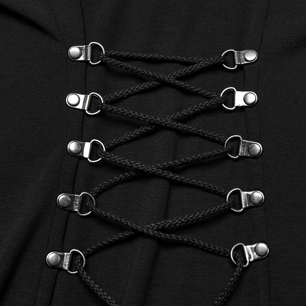 Close-up of lace-up detailing on an edgy black dress with metallic accents, highlighting punk fashion style.