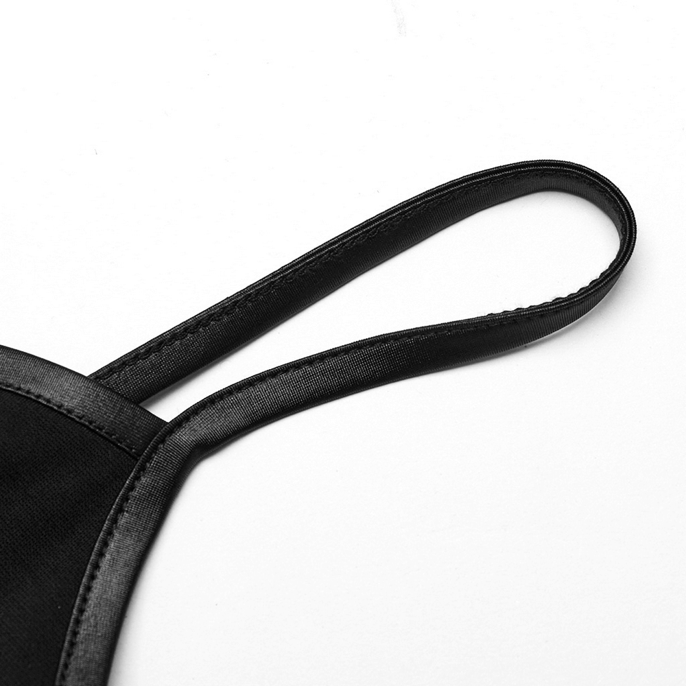 Close-up of adjustable black dress straps featuring a smooth finish for a sleek punk style look.