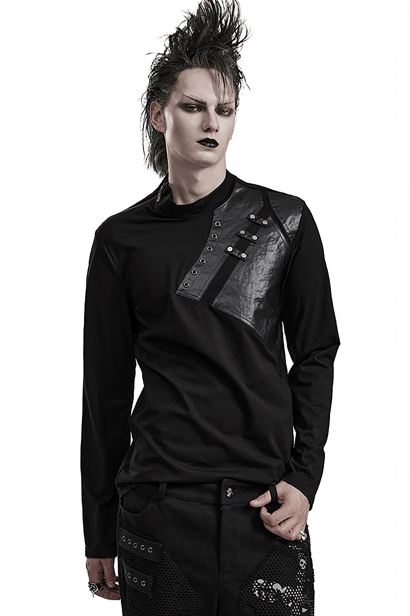 Edgy male model wearing a black long sleeve sweatshirt with metal accents and punk style, showcasing rebellious fashion.