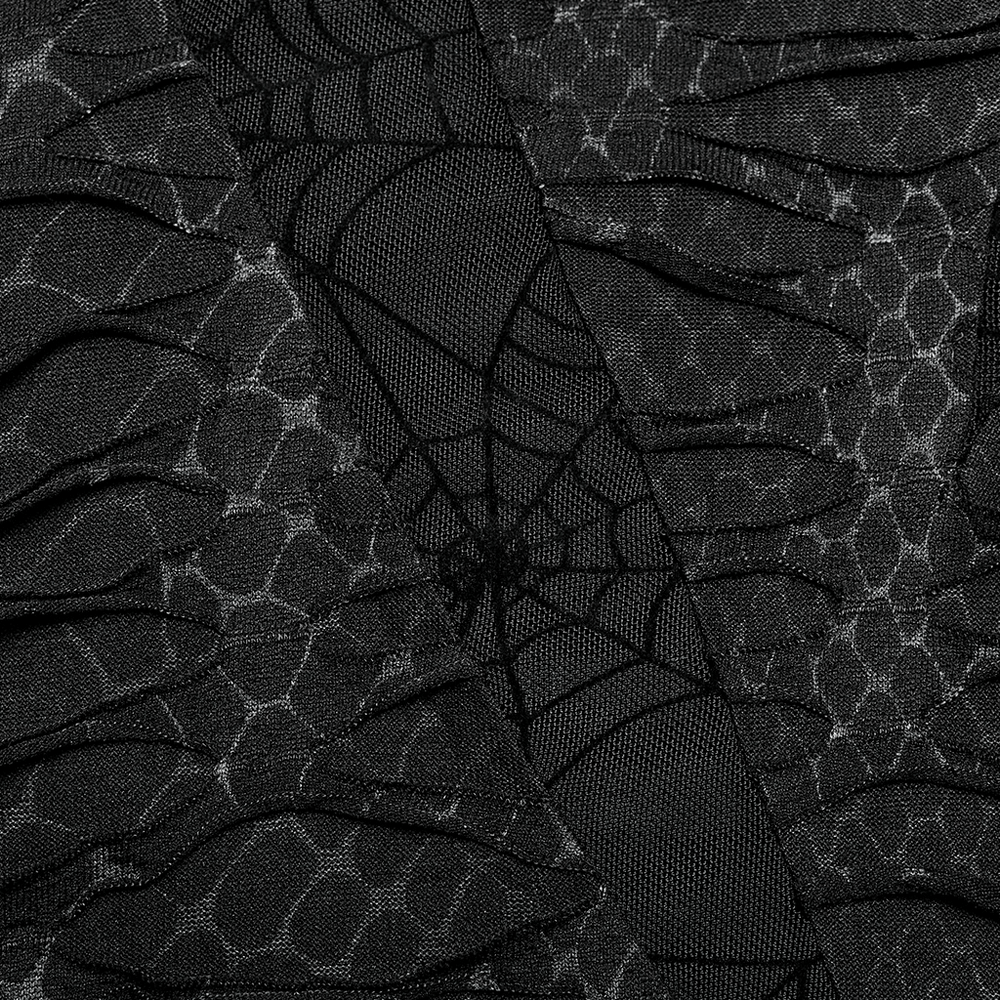 Close-up of edgy black mesh fabric with asymmetric sharp teeth texture for men's gothic fashion.