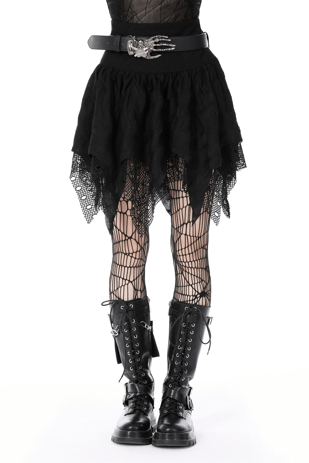 Black lace mesh skirt with irregular hem, paired with fishnet tights and edgy combat boots, showcasing gothic style.